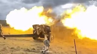 Ukrainian soldiers fire Howitzer cannons at Russian enemy targets