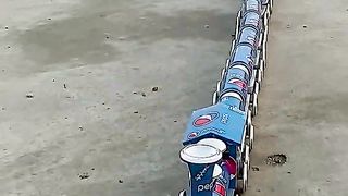 largest toy train with Pepsi cans...