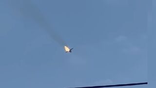 Russian fighter jet bursts into flames before crashing into lake