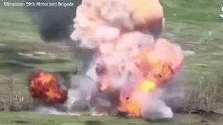 Russian tanks and ammo go up in a HUGE explosion as Ukrainian drones strike