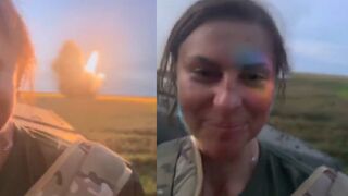 Ukranian female soldier rejoices as a High Mobility Artillery Rocket System fires onto a Russian position