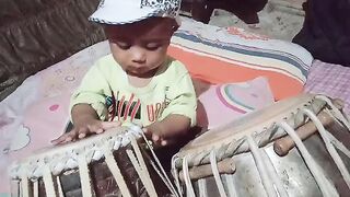 A little Baby Palying Tabla