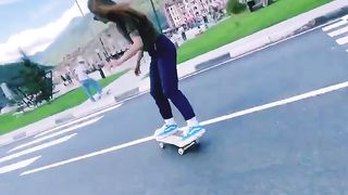 Beautiful girl on a skateboard