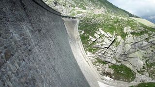 Unforgottable  ibex defies gravity and climbs a dam.