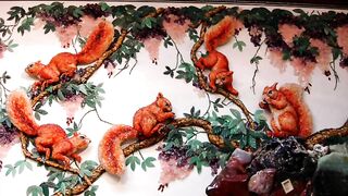 Сингапурские картинки из драгоценных камней.