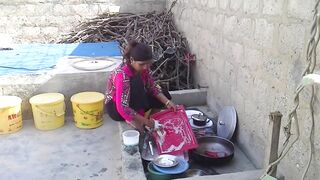 Village Woman Noreen Washing Pots