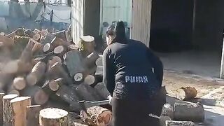 Woman wood cutting