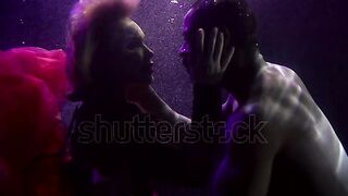 ootage-close-up-portrait-of-a-tender-couple-in-love-who-are-under-water-and-look-at-each-other-a-buxom.webm Upload video