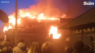 Moment Russian SU-30 plane crashes into building on test flight
