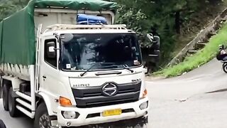Overloaded trucks burst tires on extreme inclines