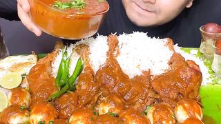 EATING SPICY CHICKEN CURRY