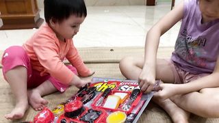 Kids and baby playing toys cooking