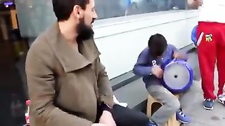 Child playing Darbuka Percussions with great skills