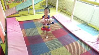 Indoor playground for kids with little girl and baby doll at play center - Abckidtv Misa
