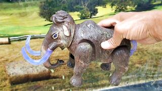 Clean up the toys of dinosaurs, cows, crocodiles, ducks, lions, elephants, rabbits