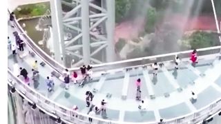 Waterfall Gate Bridge | Sky Walk Huangteng Gorge glass bridge corridor in Guangzhou China