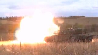 Russian T-80BV tank with improvised cage armor