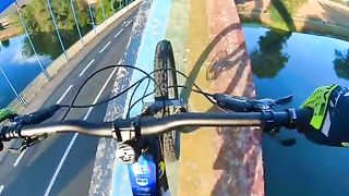 cycling on bridge pylons thousands of feet high