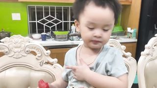 Baby eating watermelon