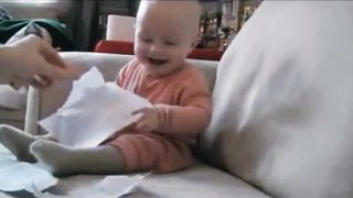 baby had a lot of fun with paper