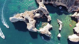 The boat passes the magical limestone cliffs of Ponta da Piedade