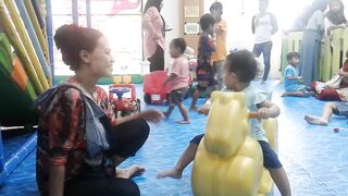CHILDREN  AND MOM PLAYING