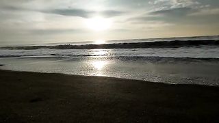 sunset with calm waves
