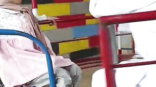 yumna and a ale are playing on the swivel chair before learning to recite the Koran