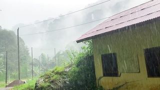 Heavy Rain in a Cliffside Village__Indonesian rural atmosphere__is very beautiful.