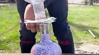 Moving Beads in Glass Bottles || ViralHog