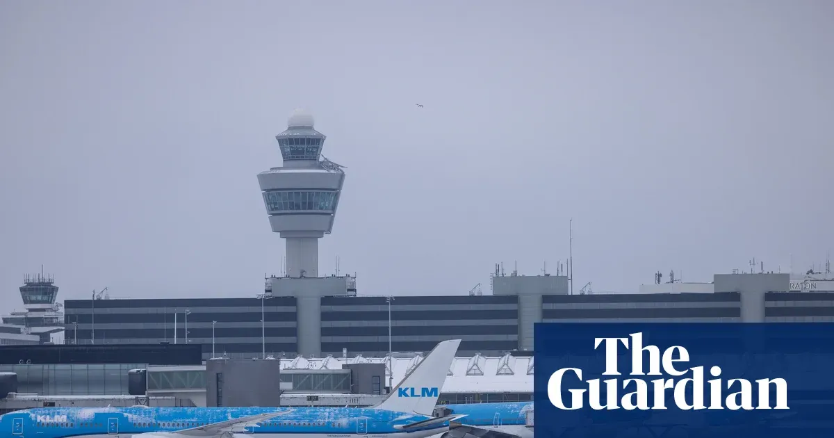 Schiphol cancels at least 700 flights as snow and wind disrupt travel — I.guim.co.uk