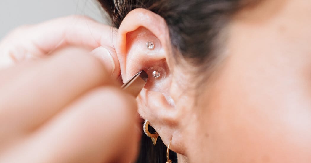 Ear seeds emerge as a fashionable wellness accessory at events and spas — Static01.nyt.com