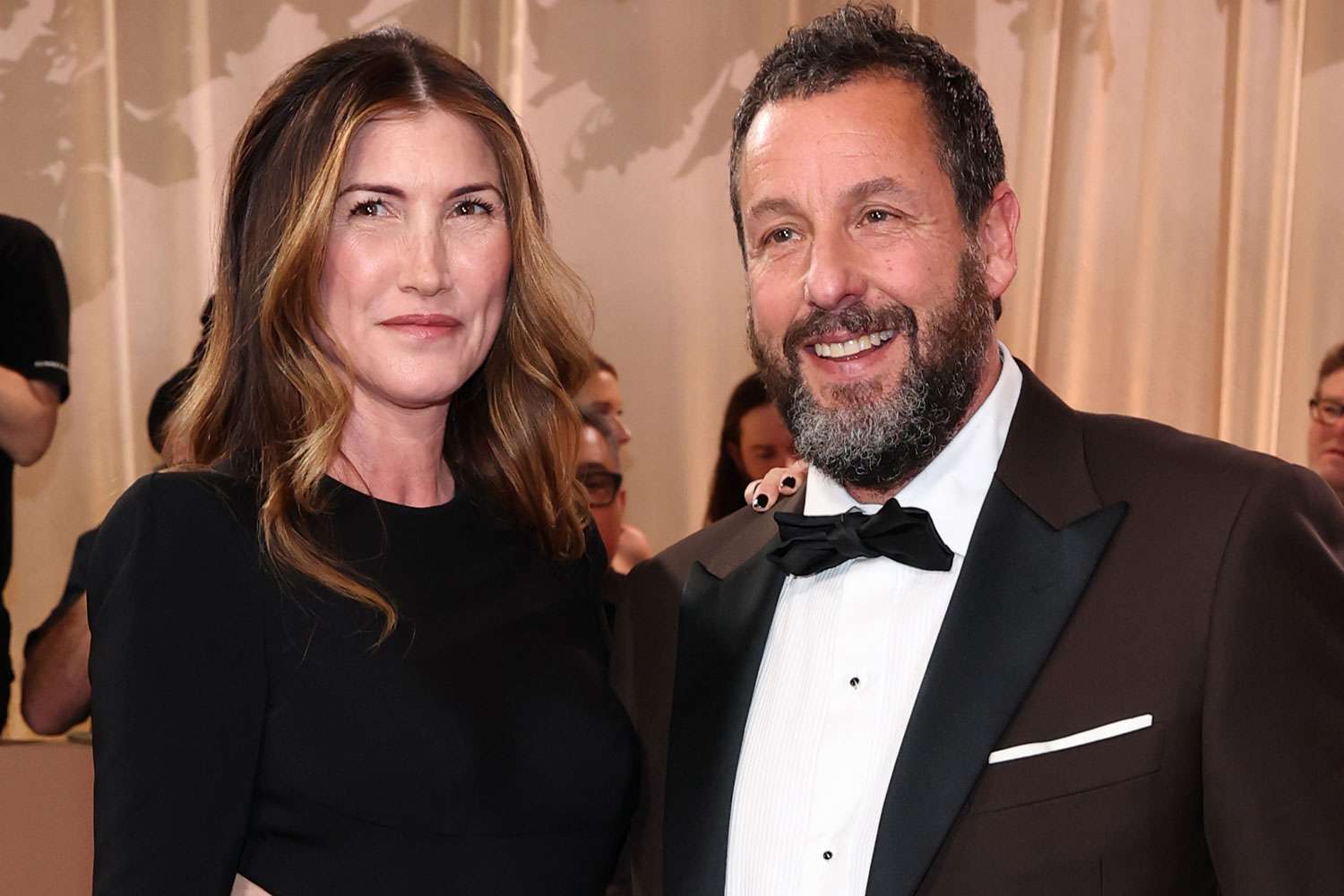 Adam Sandler and wife Jackie attend 2026 Golden Globes in matching black — People.com