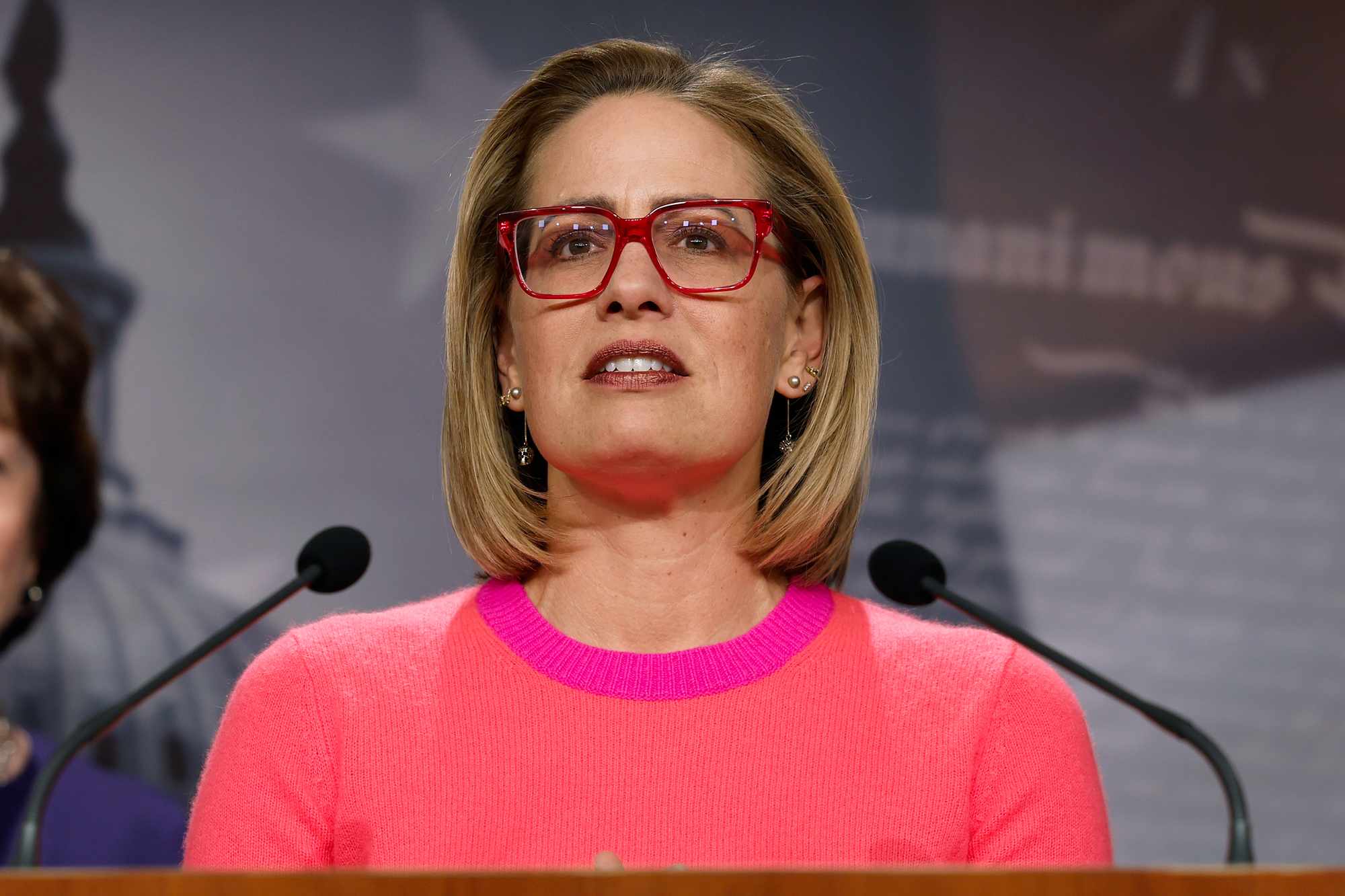Former Sen. Kyrsten Sinema sued over alleged affair with ex-bodyguard — People.com