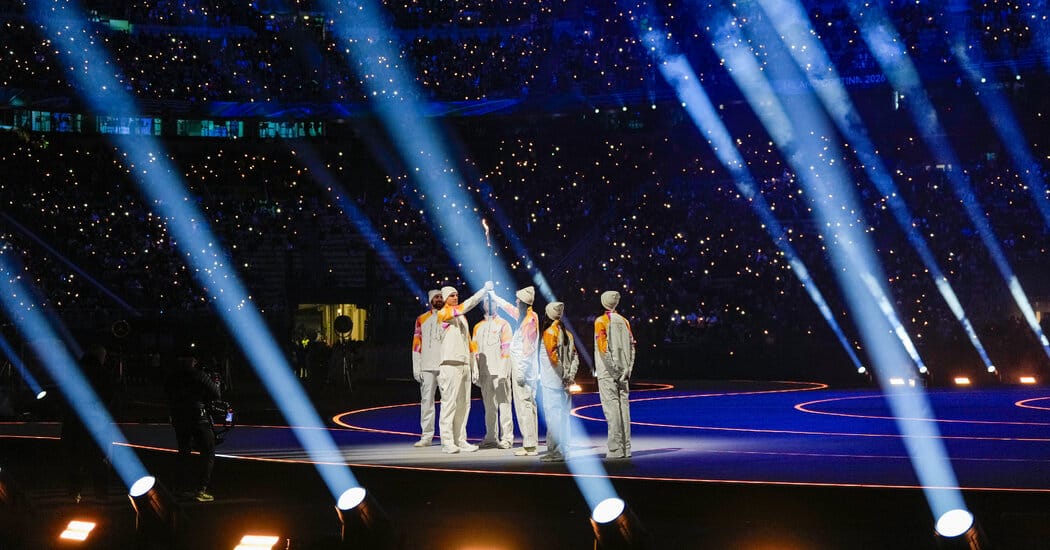 Athletes Parade at Four Sites as Winter Olympics Open in Italy — NYT > World > Europe