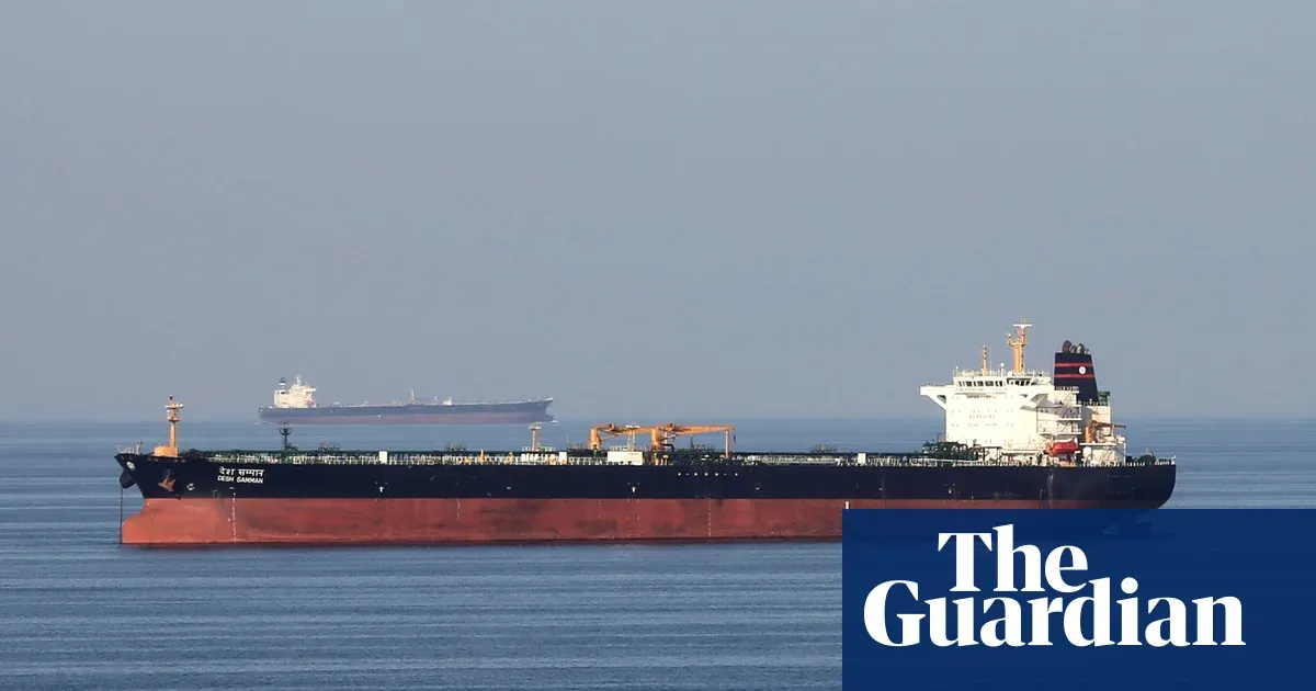 Three merchant ships struck as tensions rise in Hormuz strait amid Iran war — World news | The Guardian