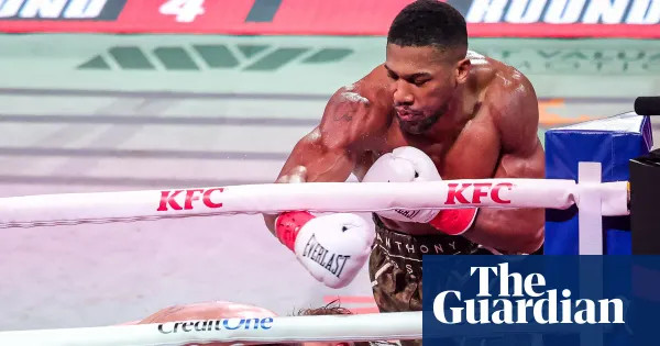 Joshua's right hand stops Jake Paul as fight draws scorn — I.guim.co.uk
