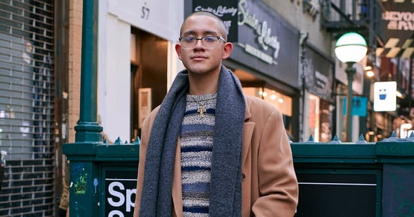 Fernando Luna in SoHo wears two-tone loafers and Veneda Carter crucifix — Static01.nyt.com