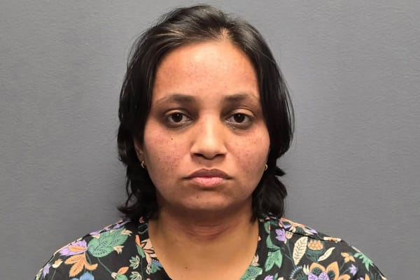 New Jersey woman arrested on double-homicide charges after two children found dead — People.com