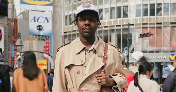 Kingsley Walters wears Baracuta trench at Shibuya Crossing — Static01.nyt.com