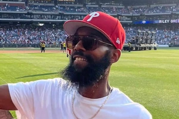 Davon Holloman charged after father Jimmy Chase allegedly stabbed while teaching 3 sons — People.com