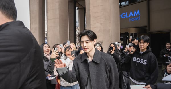 Fans keep watch outside Milan hotel to see K-pop star Sunghoon — NYT > World > Europe
