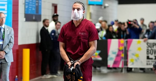 Mack Hollins’s Red Jumpsuit Stood Out in the Super Bowl Tunnel Walk — NYT > Style