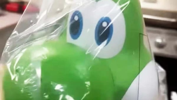 Yoshi Mario Galaxy Popcorn Bucket Looks Like He Ate A Crazy Edible — Kotaku