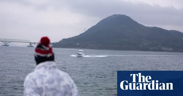 Half-abandoned Japanese island at heart of tensions with China — World news | The Guardian